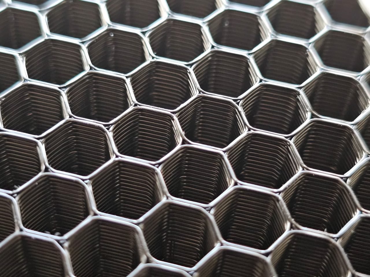 Estructura interna de relleno en panal de abeja de una pieza impresa en 3D